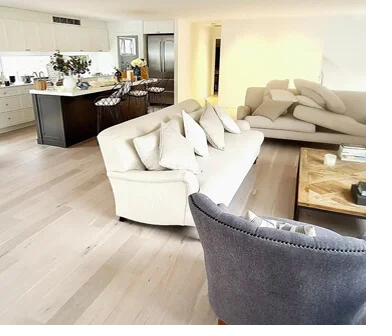 Restored timber floor in open-plan Gold Coast living room