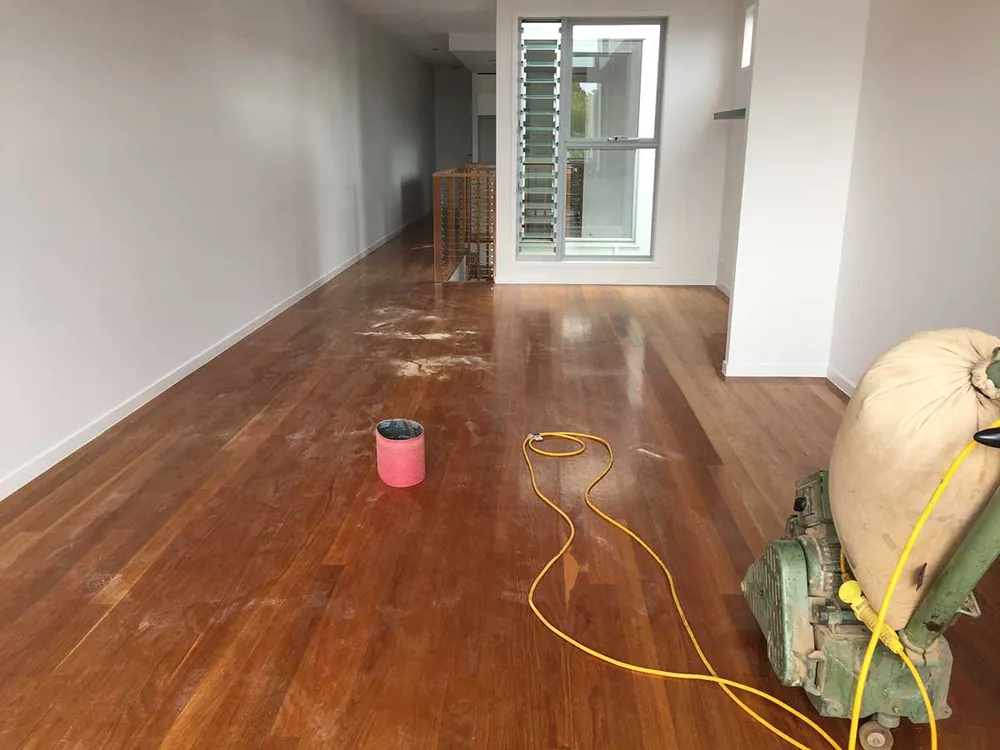 Old polish sanded off to be refinished in a water-based 2-pack satin timber floor, Gold Coast