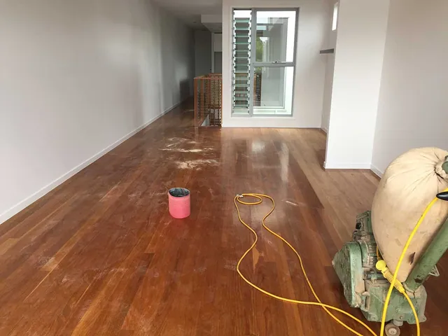 Old polish sanded off to be refinished in a water-based 2-pack satin timber floor, Gold Coast