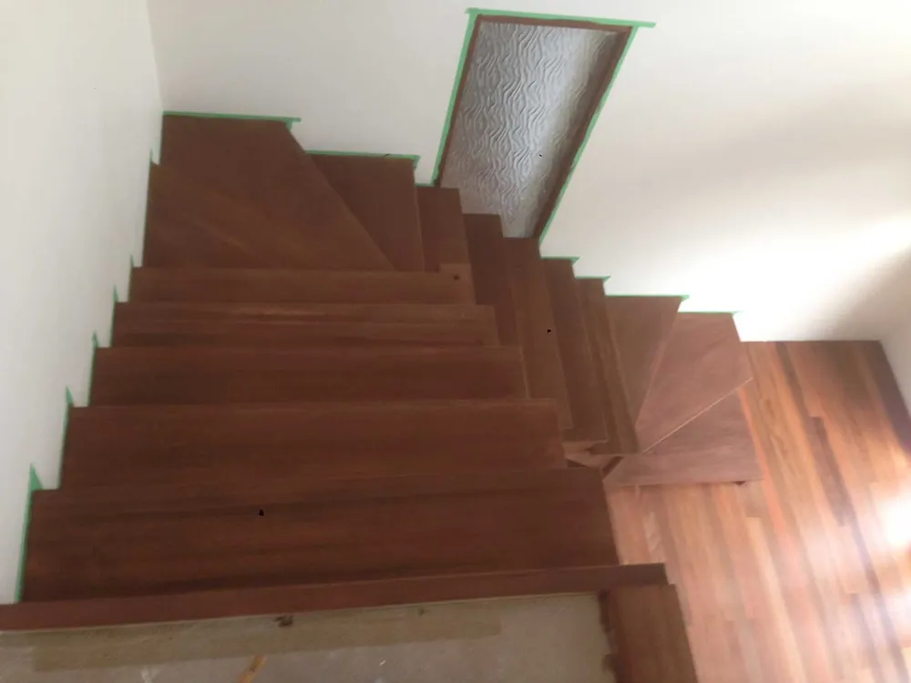 Open flight timber stairs with a walnut direct stain and polyurethane satin finish 3 e1534343556584