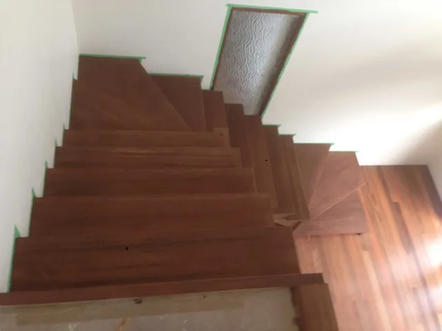 Open flight timber stairs with a walnut direct stain and polyurethane satin finish 3 e1534343556584