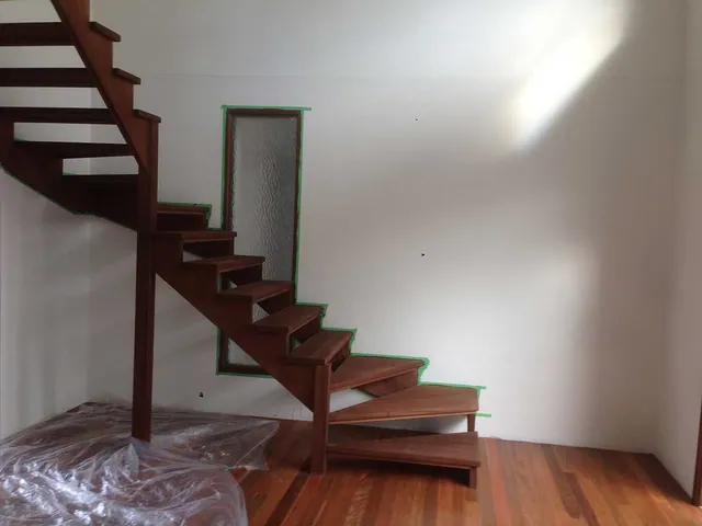 Open flight timber stairs with a walnut direct stain and polyurethane satin finish (view 2)