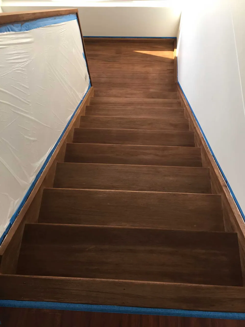 Timber stairs full sand back to bare timber with a Feast Watson walnut direct stain with a polyurethane semi gloss finish (view 2)