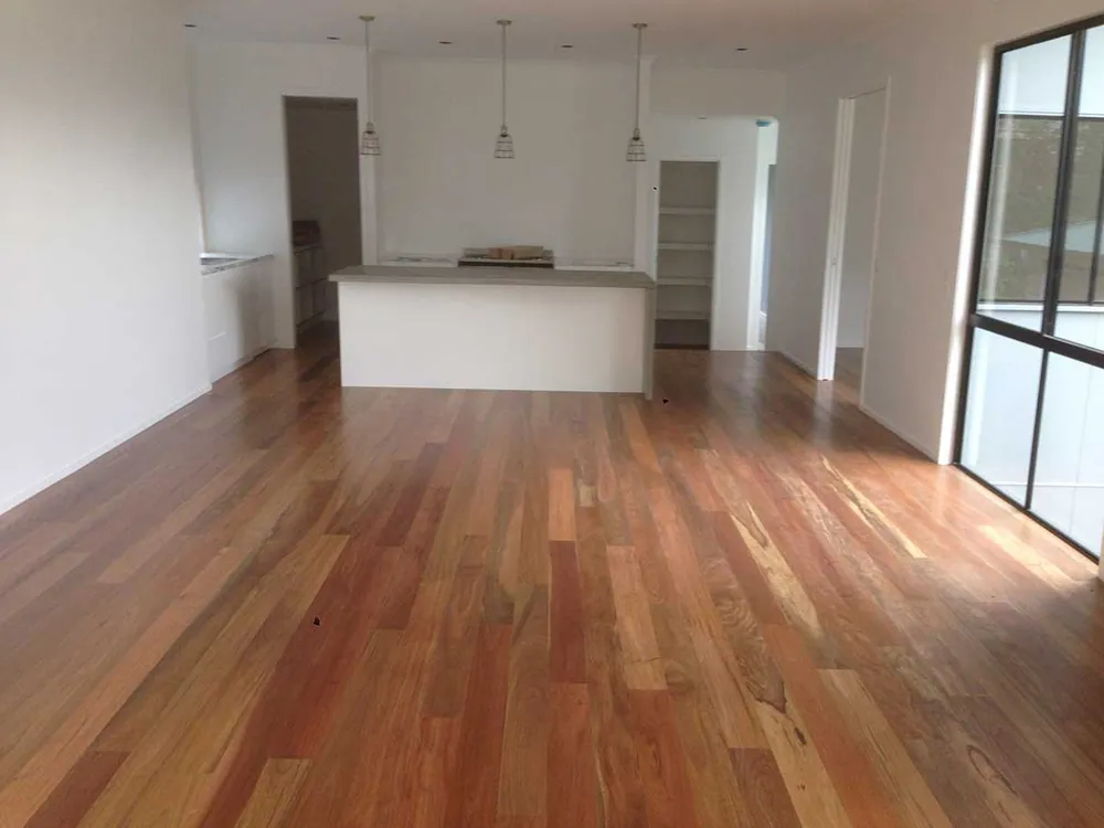 Wide board spotted gum floor with a water-based satin finish