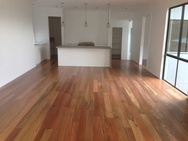 Wide board spotted gum floor with a water-based satin finish